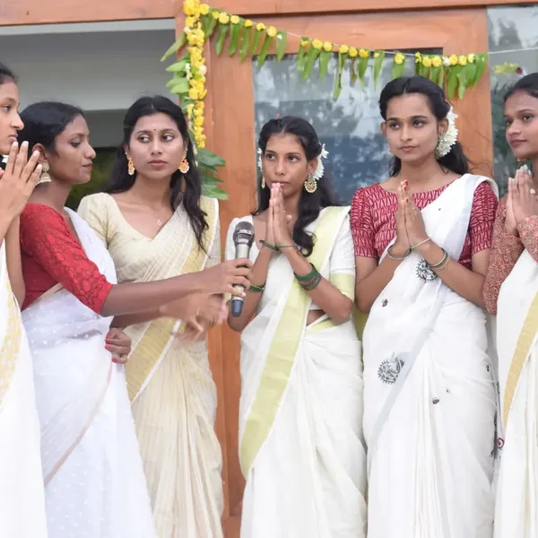 Students in traditional dress at a campus celebration